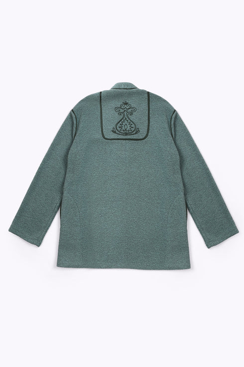 Jacket in faux fur with embroidery on the back